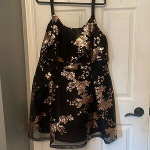 Black and glittery gold dress